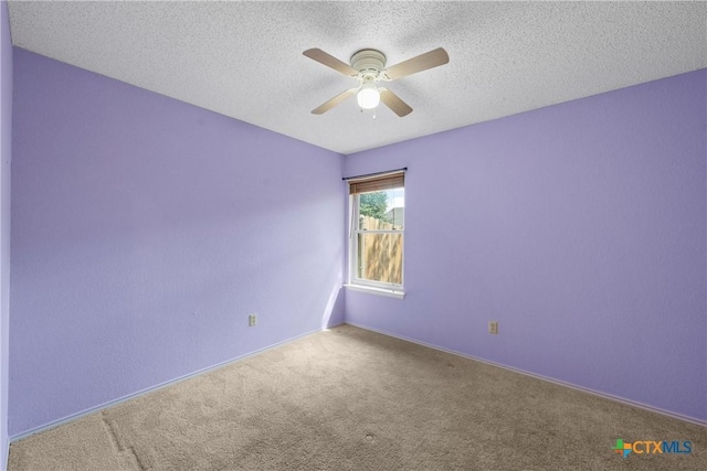 1007 Judy Ln, Copperas Cove, TX 76522 - spare room featuring carpet, ceiling fan, and a textured ceiling