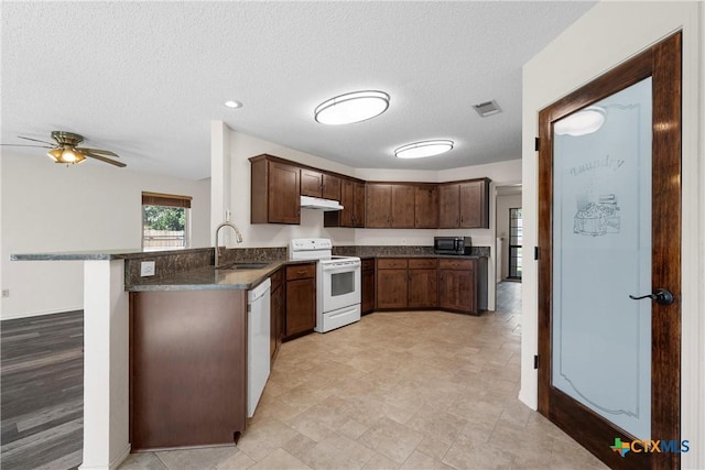 1007 Judy Ln, Copperas Cove, TX 76522 - kitchen featuring white appliances, under cabinet range hood, ceiling fan, a textured ceiling, and a peninsula