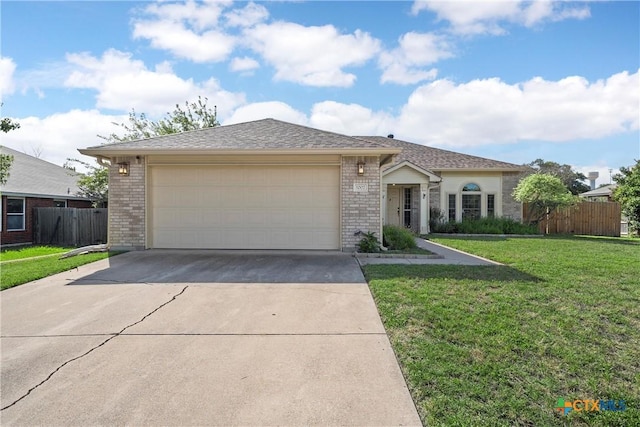 1007 Judy Ln, Copperas Cove, TX 76522 - ranch-style home with brick siding, driveway, and an attached garage