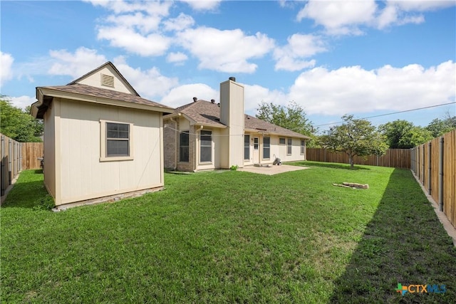 1007 Judy Ln, Copperas Cove, TX 76522 - rear view of house with a fenced backyard, a chimney, a patio, and roof with shingles