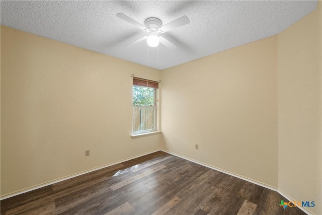 1007 Judy Ln, Copperas Cove, TX 76522 - empty room featuring dark wood finished floors, a ceiling fan, and a textured ceiling