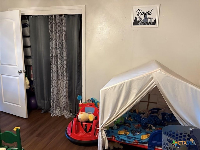 bedroom featuring hardwood / wood-style floors