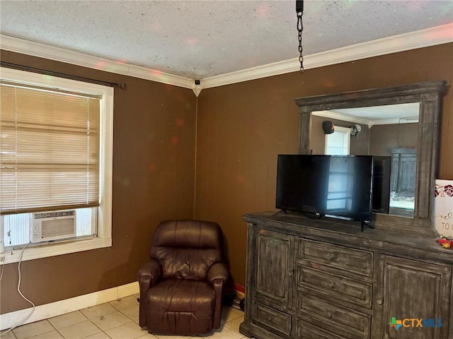 living area featuring cooling unit, light tile patterned floors, ornamental molding, and a textured ceiling