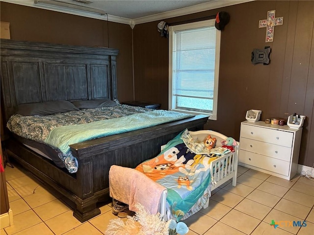 tiled bedroom featuring ornamental molding