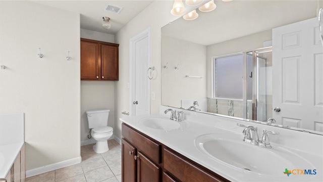 full bathroom with vanity, tile patterned floors, independent shower and bath, and toilet