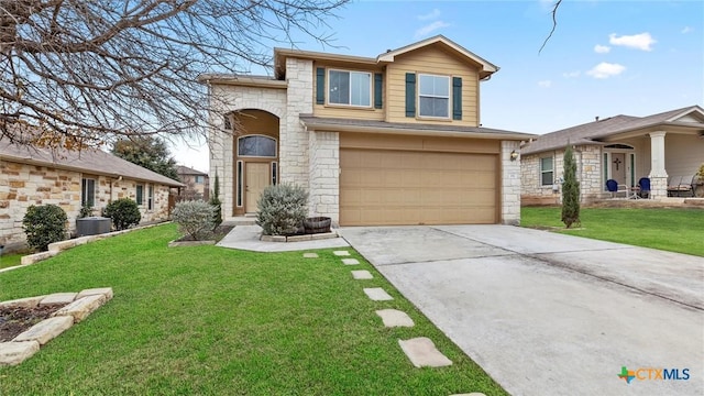 view of front property featuring a garage and a front yard