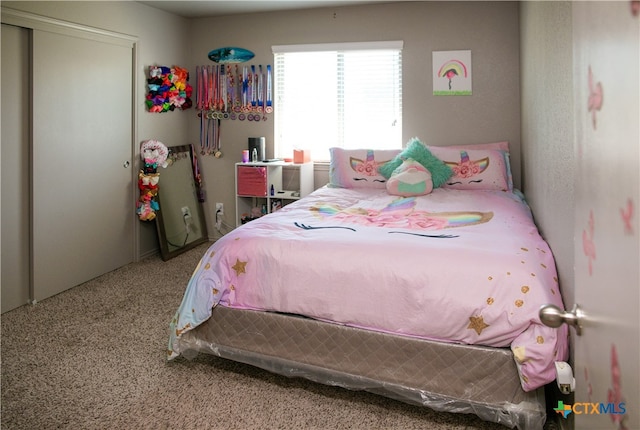 bedroom featuring carpet flooring