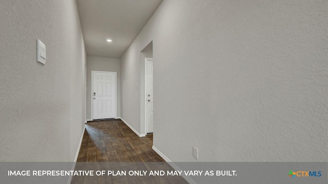 corridor with dark hardwood / wood-style floors