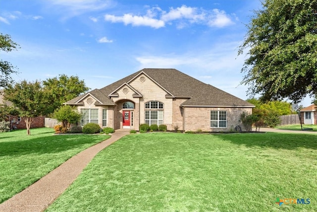 view of front of home with a front lawn