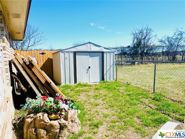 view of outbuilding featuring a yard