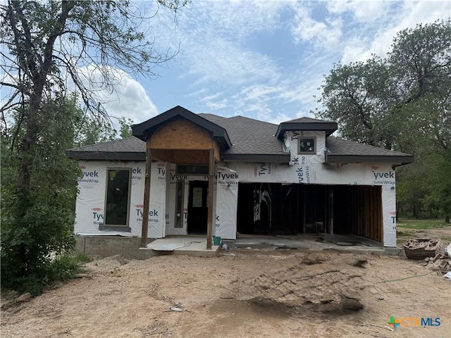 TBD Mathis Rd, San Antonio, TX 78264 - view of front of house featuring roof with shingles, driveway, and a garage