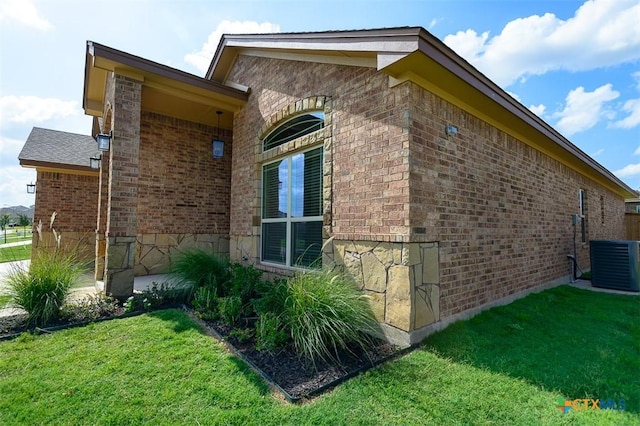 1010 Winchester Dr, Nolanville, TX 76559 - view of side of property with brick siding and a lawn