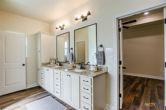 1010 Winchester Dr, Nolanville, TX 76559 - full bath featuring double vanity and wood finished floors