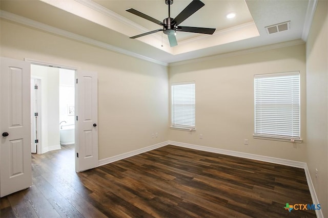 1010 Winchester Dr, Nolanville, TX 76559 - spare room featuring crown molding, a raised ceiling, dark wood finished floors, a ceiling fan, and recessed lighting