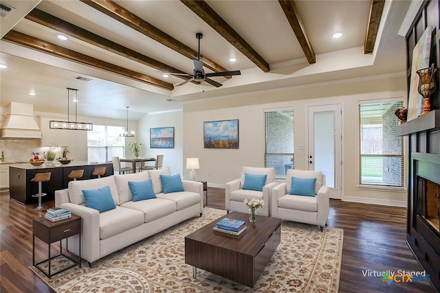 1010 Winchester Dr, Nolanville, TX 76559 - living area featuring dark wood finished floors, a chandelier, ceiling fan, beamed ceiling, and recessed lighting