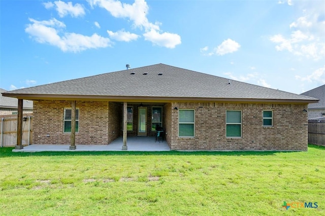 1010 Winchester Dr, Nolanville, TX 76559 - back of house featuring brick siding, a patio area, and a shingled roof