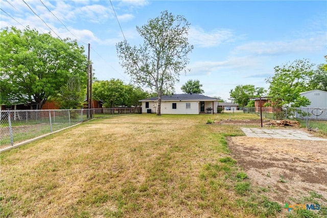 view of yard featuring a fenced backyard