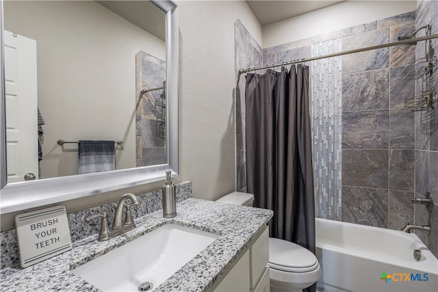 full bathroom with shower / bath combination with curtain, vanity, and toilet