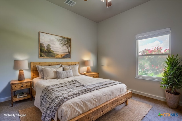 carpeted bedroom with ceiling fan