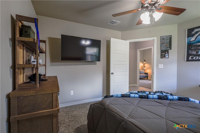 bedroom with ceiling fan and carpet floors