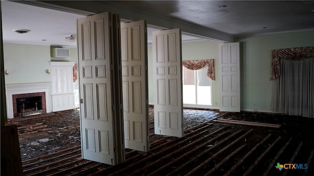 hallway with ornamental molding, visible vents, and dark wood-type flooring