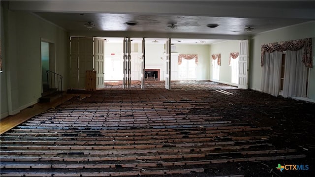 unfurnished room with a fireplace