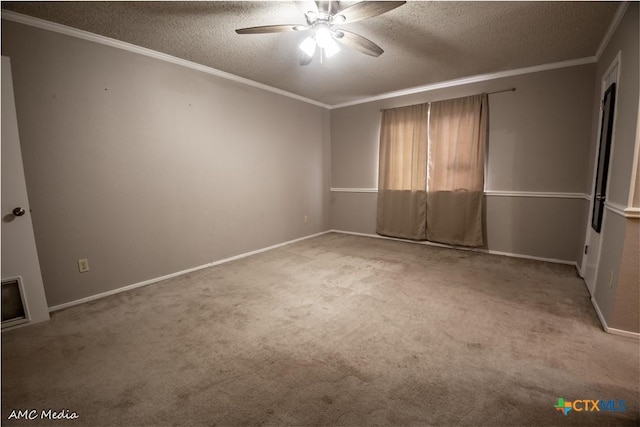 unfurnished room with ornamental molding, carpet flooring, ceiling fan, and a textured ceiling