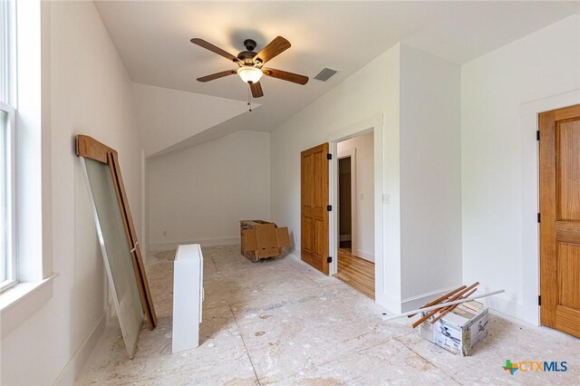 204 Ave F, Shiner, TX 77984 - interior space with a ceiling fan, baseboards, visible vents, and vaulted ceiling