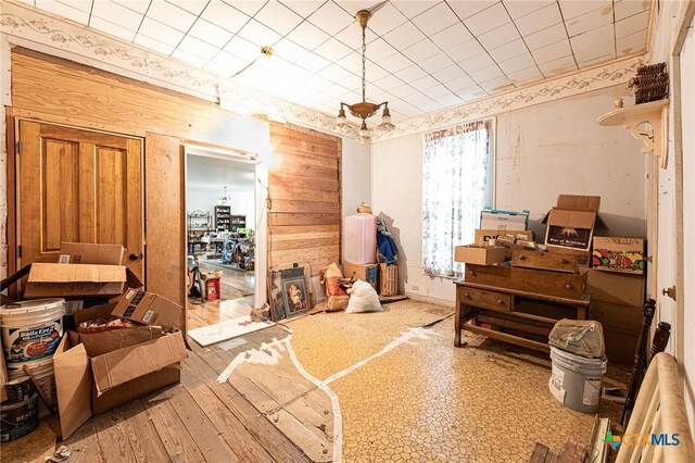 204 Ave F, Shiner, TX 77984 - miscellaneous room with wooden walls