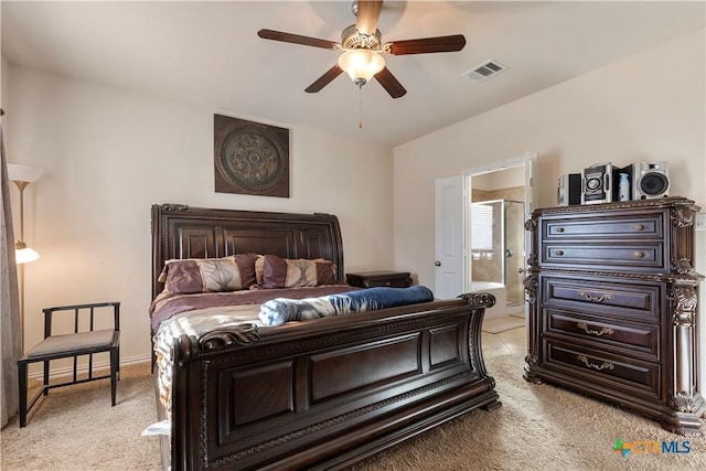 carpeted bedroom featuring connected bathroom and ceiling fan