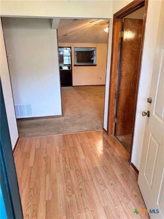 spare room with light wood-type flooring