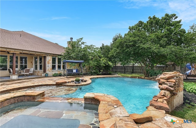 112 Oak Plaza Dr, Georgetown, TX 78628 - view of pool with a fenced backyard, a patio area, a pool with connected hot tub, and ceiling fan