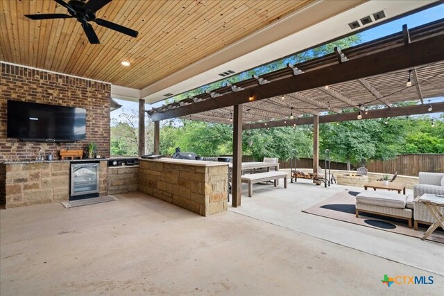 3006 Beulah Blvd, Belton, TX 76513 - view of patio with beverage cooler, area for grilling, fence, a fire pit, and a pergola