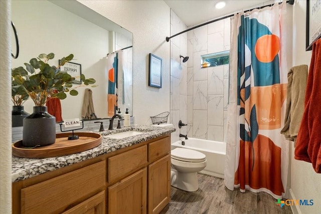 3006 Beulah Blvd, Belton, TX 76513 - bathroom with wood finished floors, shower / bath combination with curtain, double vanity, and toilet