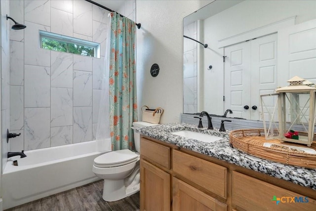 3006 Beulah Blvd, Belton, TX 76513 - bathroom featuring shower / tub combo, wood finished floors, toilet, and vanity