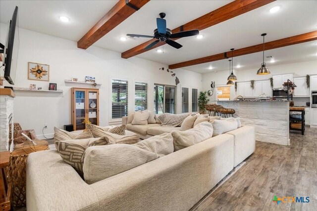 3006 Beulah Blvd, Belton, TX 76513 - living area with recessed lighting, a ceiling fan, wood finished floors, beam ceiling, and a fireplace