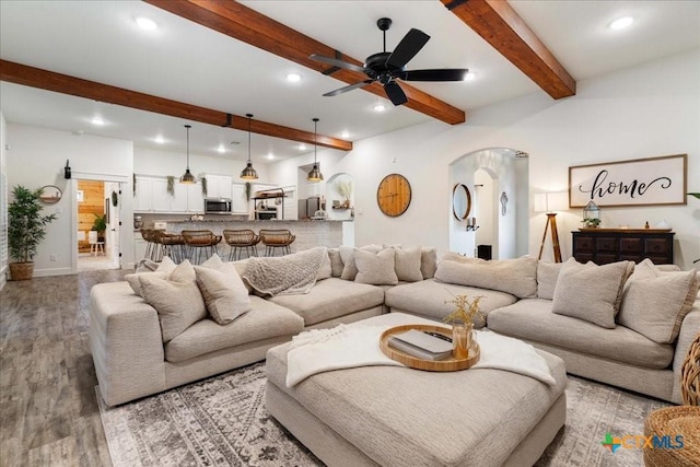 3006 Beulah Blvd, Belton, TX 76513 - living room featuring arched walkways, beamed ceiling, recessed lighting, light wood finished floors, and ceiling fan