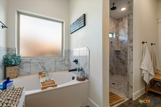3006 Beulah Blvd, Belton, TX 76513 - full bath featuring a tile shower, a garden tub, wood finished floors, and baseboards