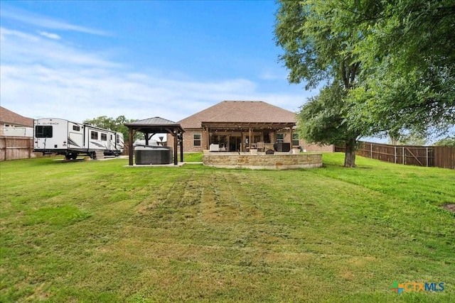 3006 Beulah Blvd, Belton, TX 76513 - back of property with a gazebo, a hot tub, and a patio area