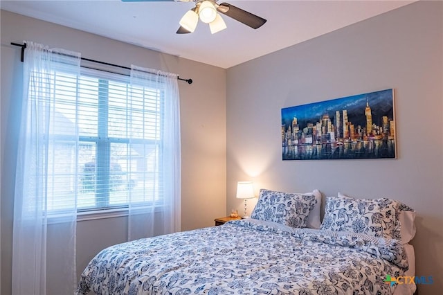 bedroom featuring ceiling fan