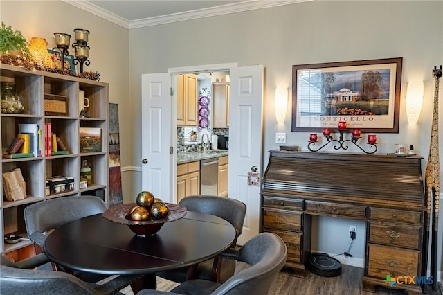 interior space featuring crown molding, dark wood-type flooring, and sink