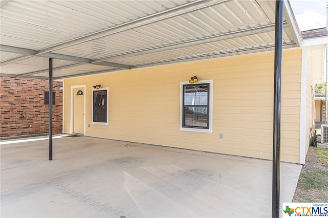 view of patio / terrace with a carport