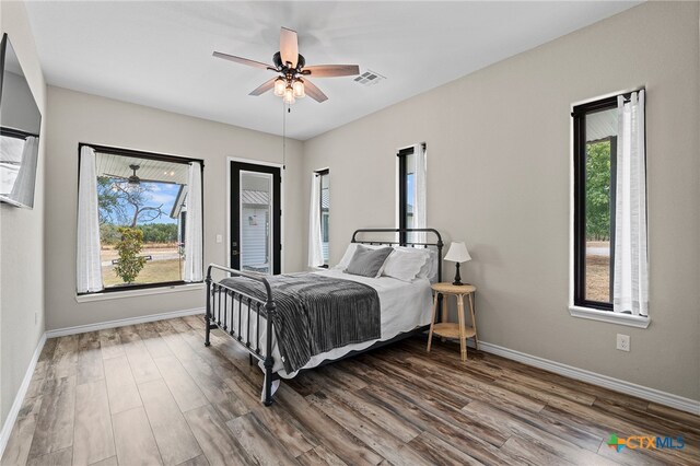 bedroom featuring hardwood / wood-style flooring and ceiling fan