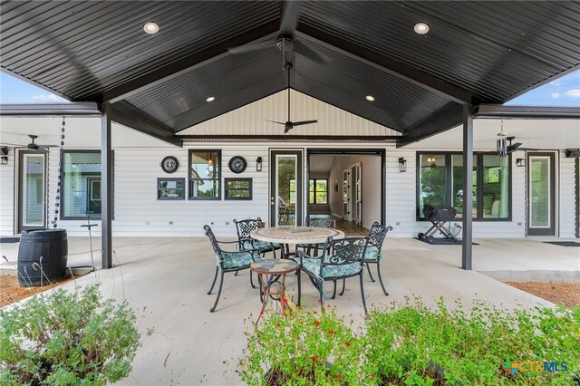 view of patio with ceiling fan and cooling unit