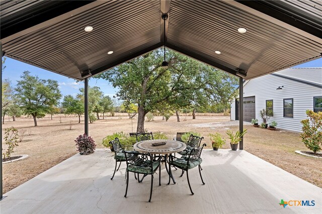 view of patio / terrace with a garage