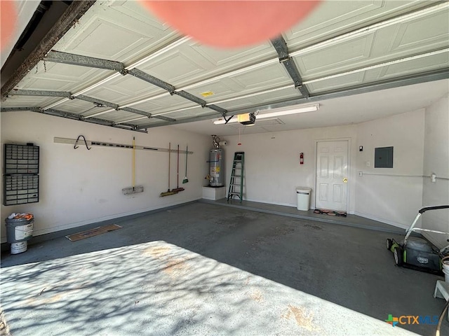 garage with secured water heater, electric panel, and a garage door opener