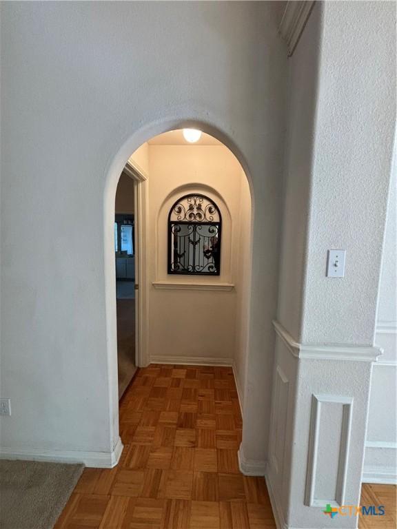 hall with light parquet floors