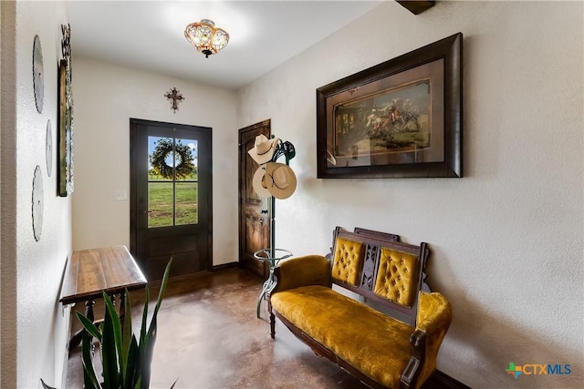 sitting room with concrete floors