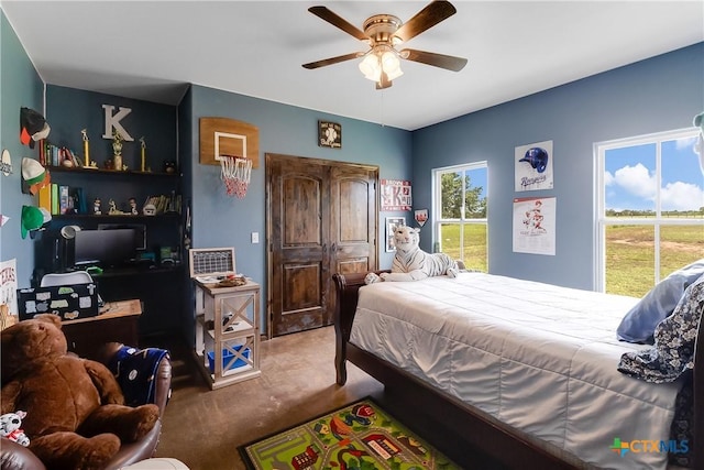 bedroom featuring carpet flooring and ceiling fan