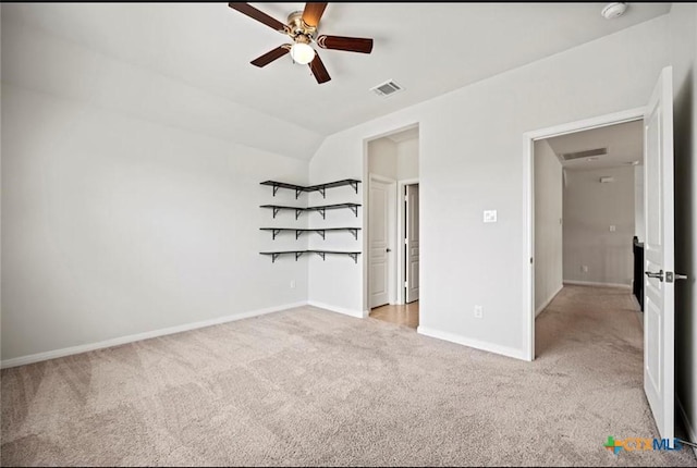 30125 Prairie Creek Ct, Brookshire, TX 77423 - unfurnished bedroom with light colored carpet, lofted ceiling, and a ceiling fan